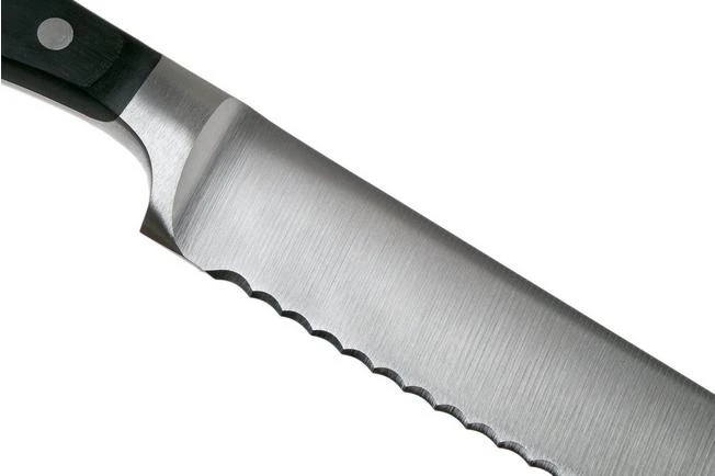 Wüsthof Classic Serrated Carving Knife 23 Cm, 1040100923 6 Wüsthof Classic Serrated Carving Knife 23 Cm, 1040100923 - Image 4